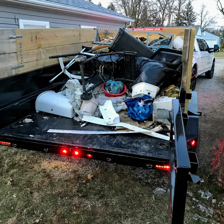 Roll-off dumpster delivered to a residential driveway in Jurupa Valley