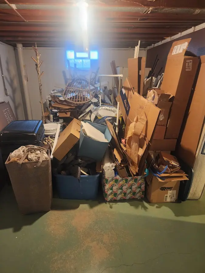 Roll-off dumpster container at job site for 20 Yard Dumpster Rental in Jurupa Valley